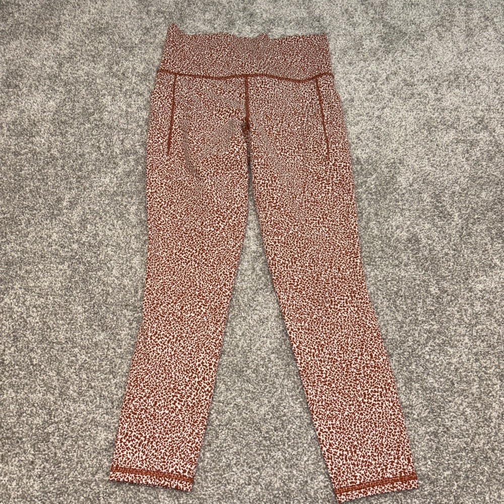 Athleta Leggings Womens Small Orange Salutation Stash II Textured Tight‎ Gym Run